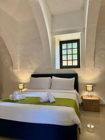 Casa (Cornucopia Farmhouse) | Edredones de plumas, minibar, cortinas opacas y ropa de cama. Cornucopia Hotel