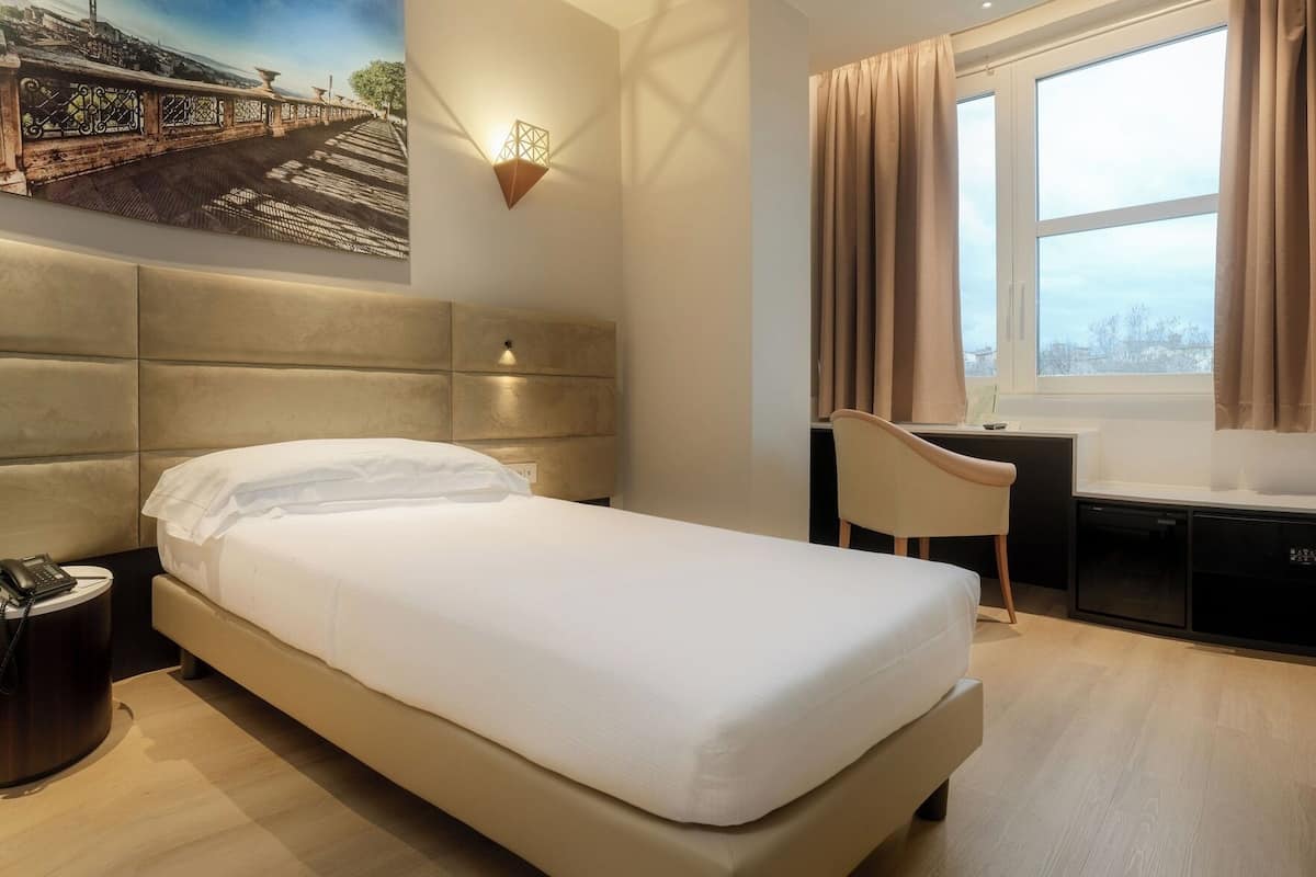 Frette Italian sheets, premium bedding, down duvets, minibar