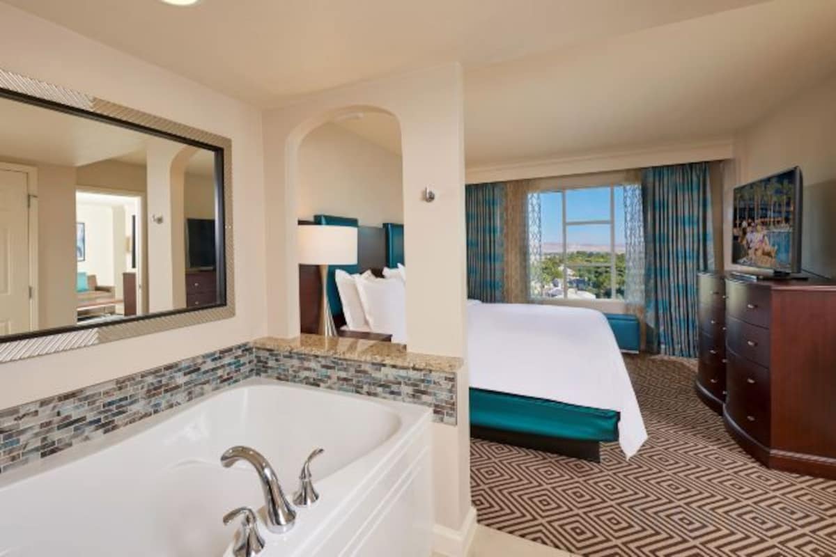 Premium bedding, down comforters, pillowtop beds, in-room safe