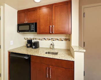 Microwave, coffee/tea maker, toaster, cookware/dishes/utensils at Hilton Grand Vacations Club Paradise Las Vegas