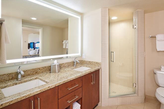 Designer toiletries, hair dryer, bathrobes, towels