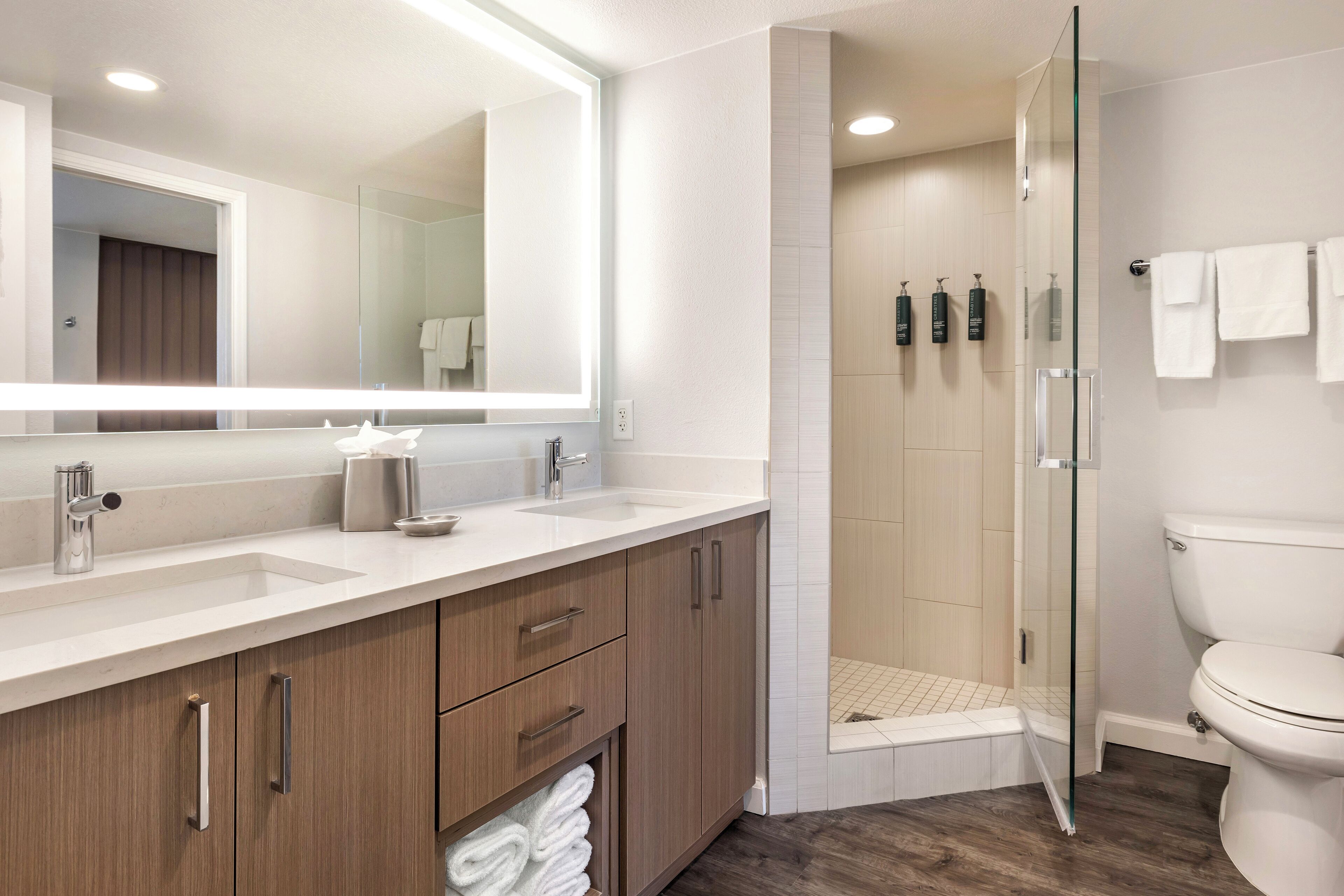 Designer toiletries, hair dryer, bathrobes, towels