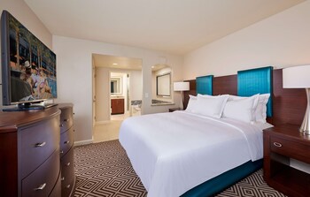 Premium bedding, down comforters, pillowtop beds, in-room safe at Hilton Grand Vacations Club Paradise Las Vegas