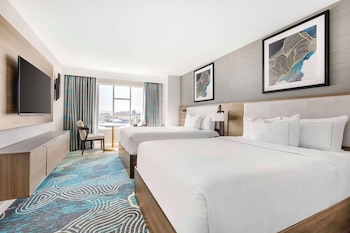 Premium bedding, down comforters, pillowtop beds, in-room safe at Hilton Grand Vacations Club Paradise Las Vegas
