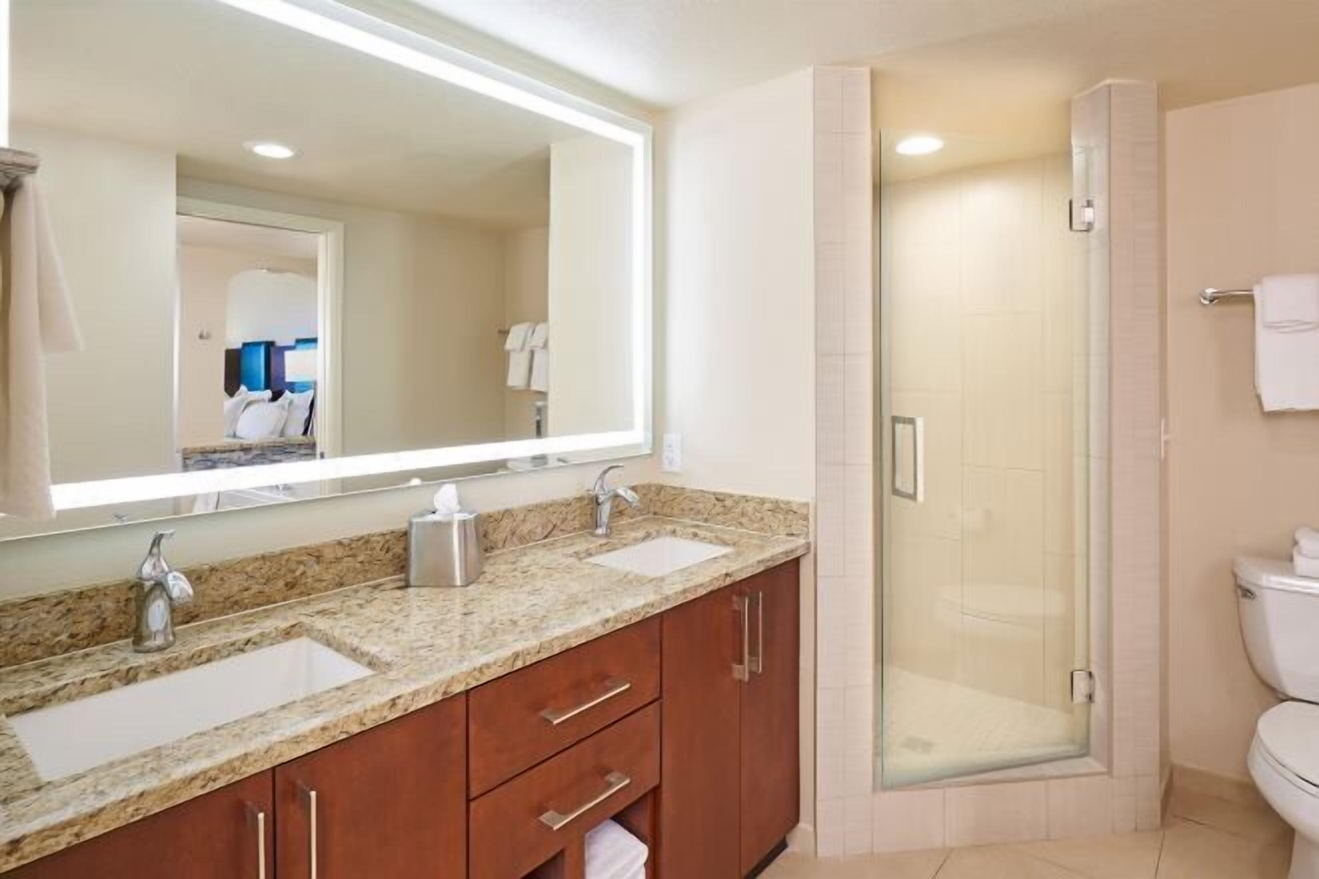 Designer toiletries, hair dryer, bathrobes, towels