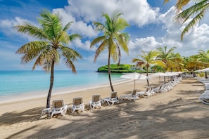 On the beach, white sand, free beach shuttle, beach cabanas