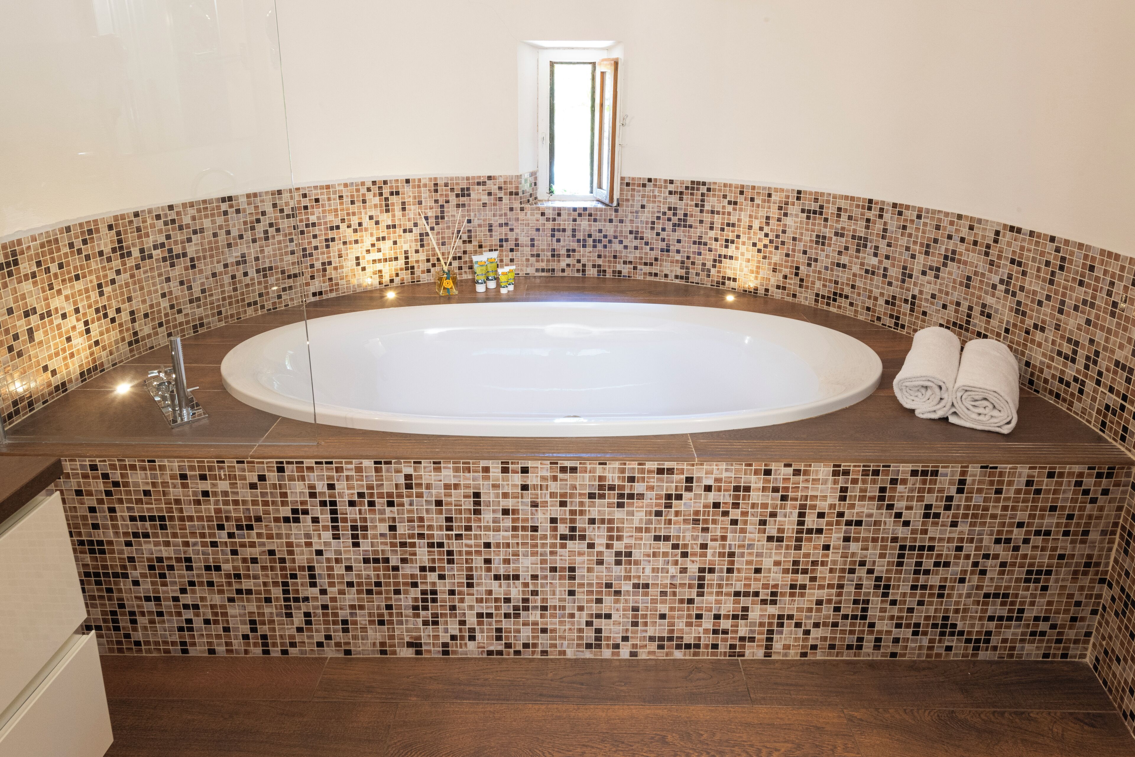 terrace suite | bathroom | eco-friendly toiletries, hair dryer, slippers, bidet