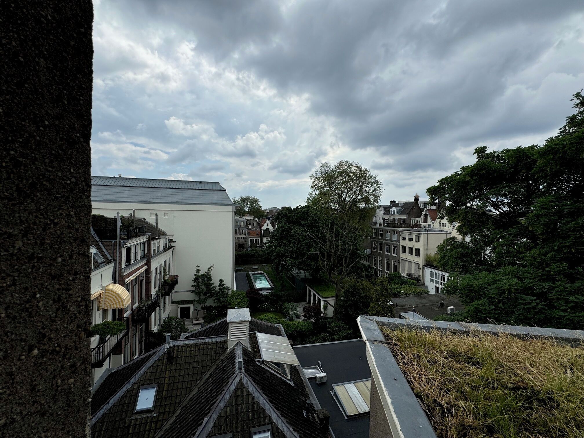 A residential area with traditional architecture, including pitched roofs and a mix of building styles.
