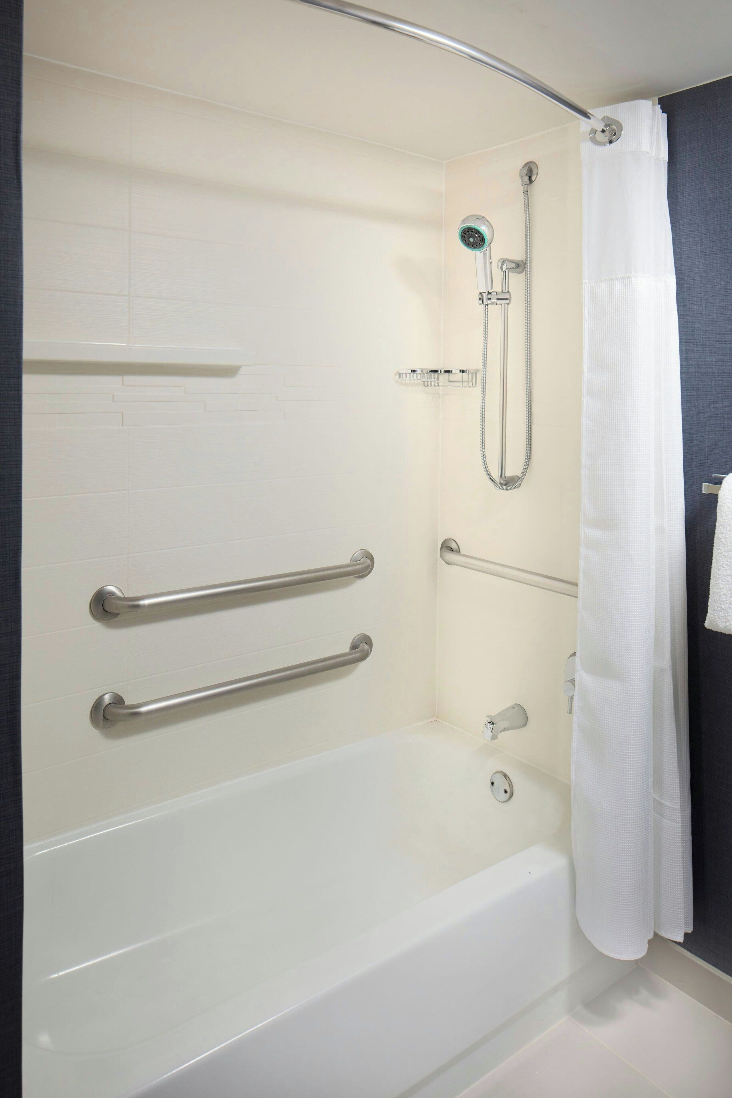 combined shower/bathtub, free toiletries, hair dryer, towels