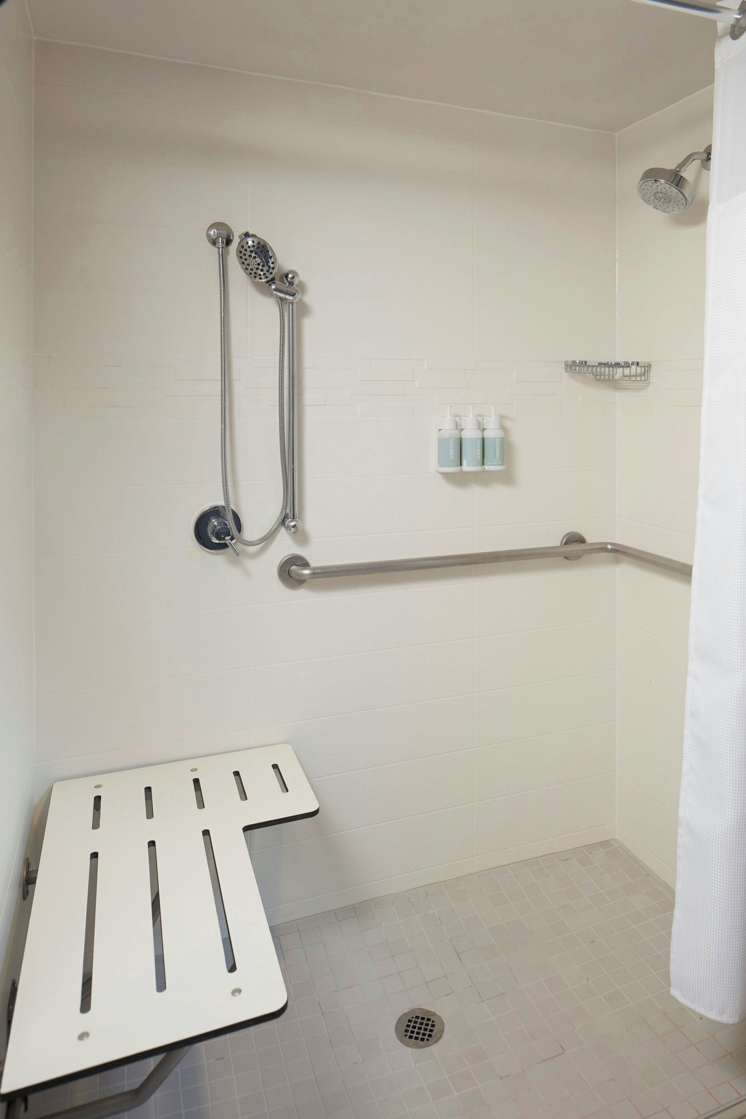 combined shower/bathtub, free toiletries, hair dryer, towels