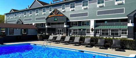 Seasonal outdoor pool, open 8:00 AM to 8:00 PM, pool umbrellas