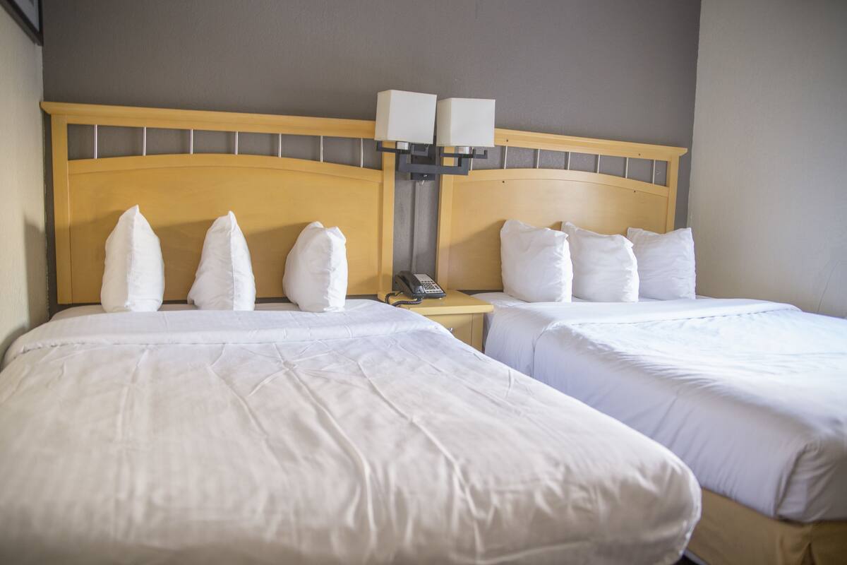 Standard Room, 2 Double Beds | Desk, iron/ironing board, WiFi (free), bed sheets