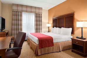 Hypo-allergenic bedding, desk, laptop workspace, blackout curtains