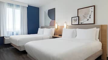 1 quarto, camas com colchões pillow-top, escrivaninha