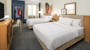 Pillow-top beds, desk, laptop workspace, blackout curtains