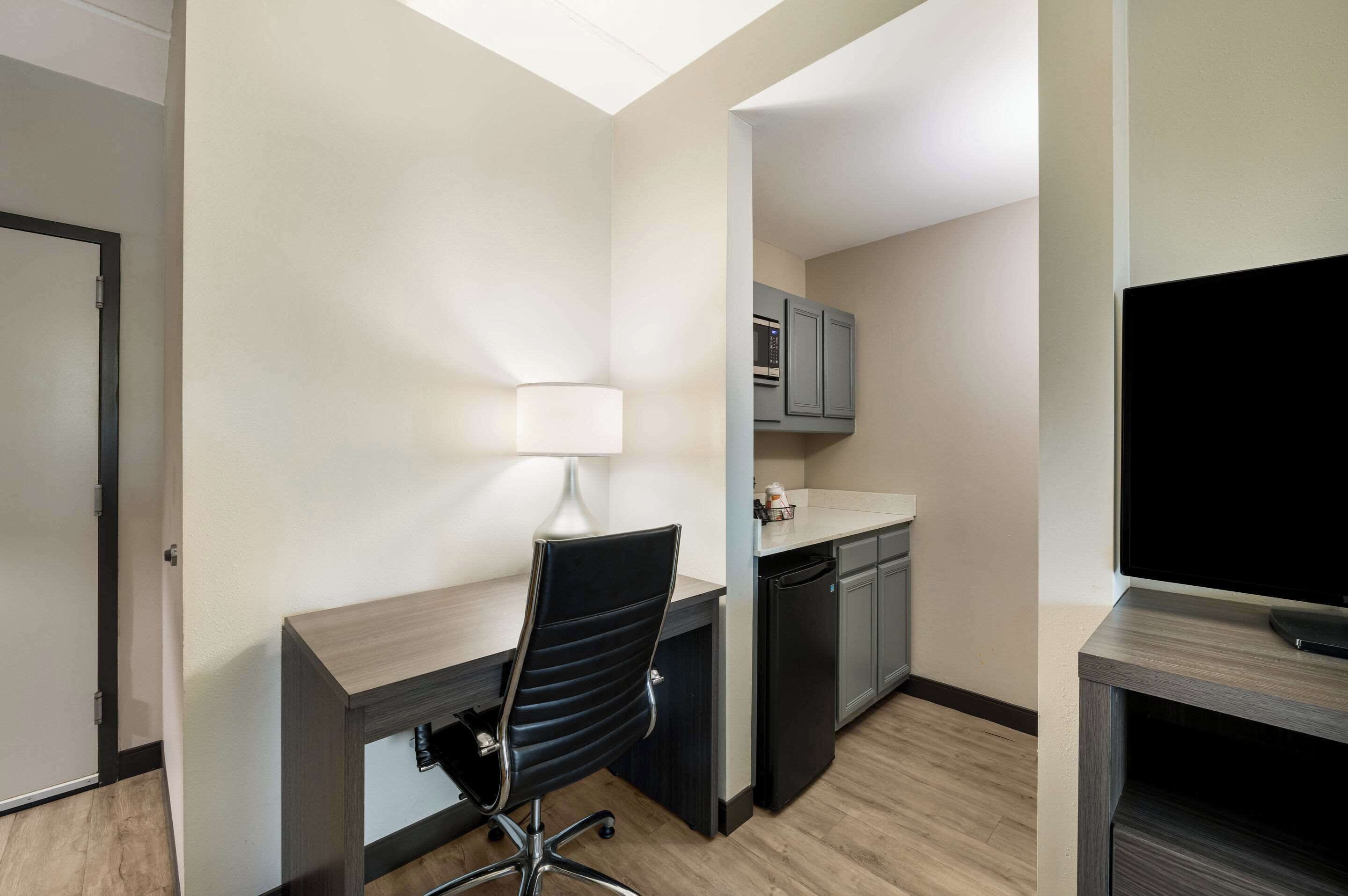 business suite, 1 king bed, accessible, non smoking | desk, laptop workspace, iron/ironing board, free wifi