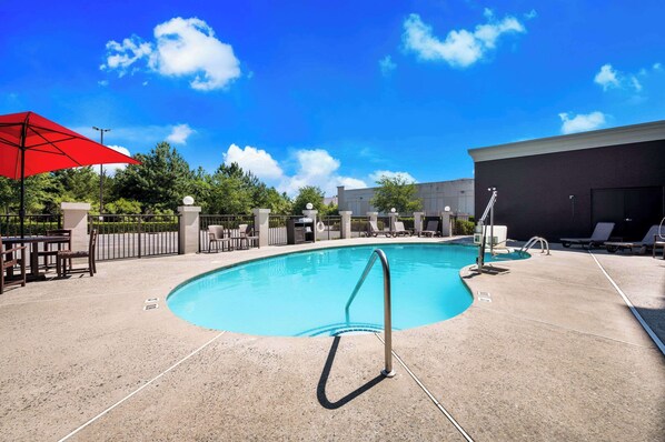 Outdoor pool, open 10:00 AM to 8:00 PM, pool umbrellas
