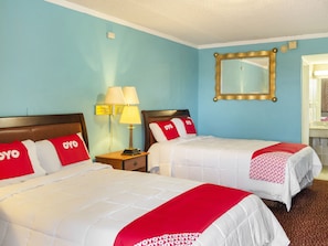 Room, 2 Double Beds | In-room safe, iron/ironing board, free WiFi, bed sheets