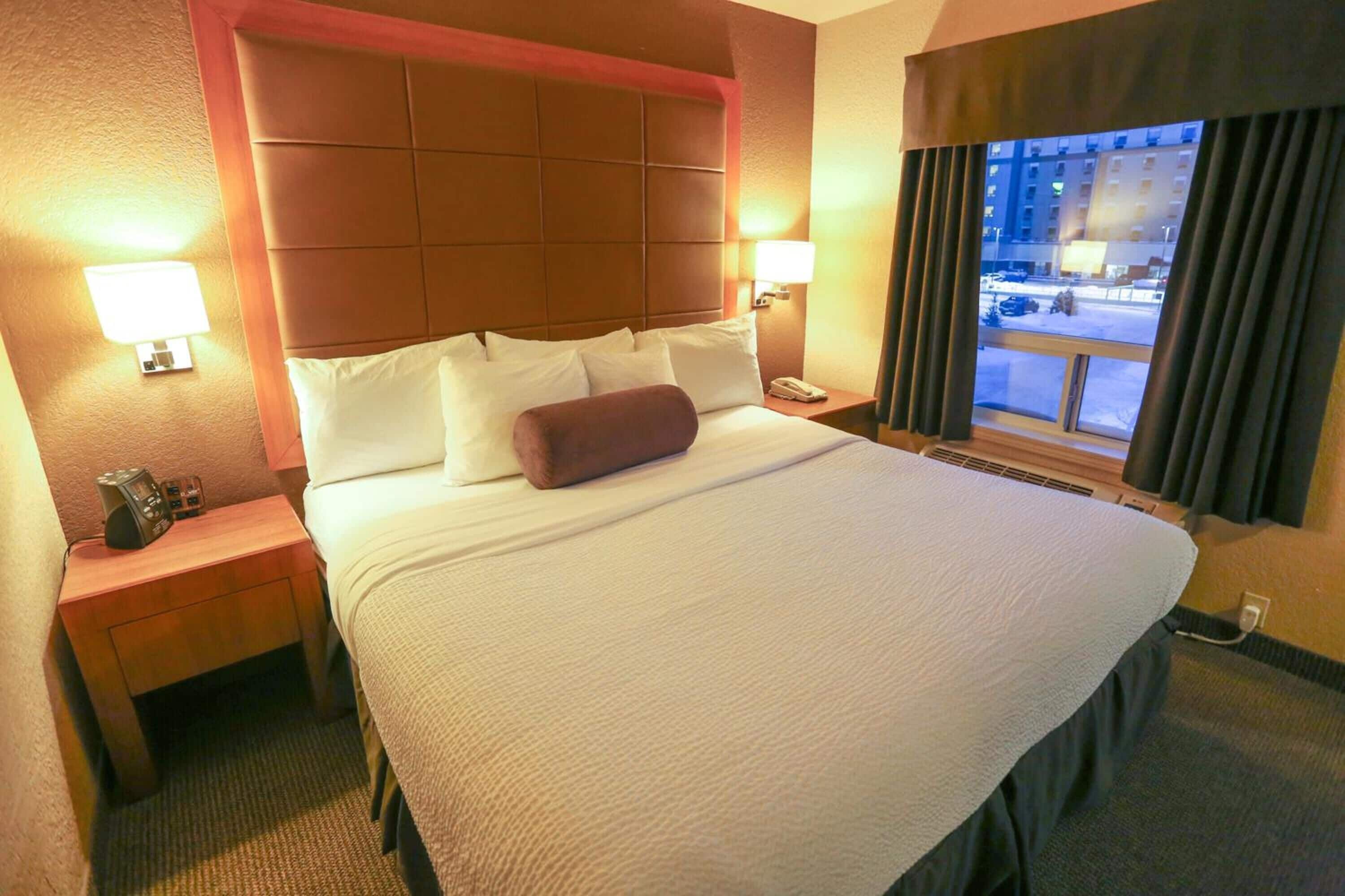 Premium bedding, desk, blackout curtains, iron/ironing board