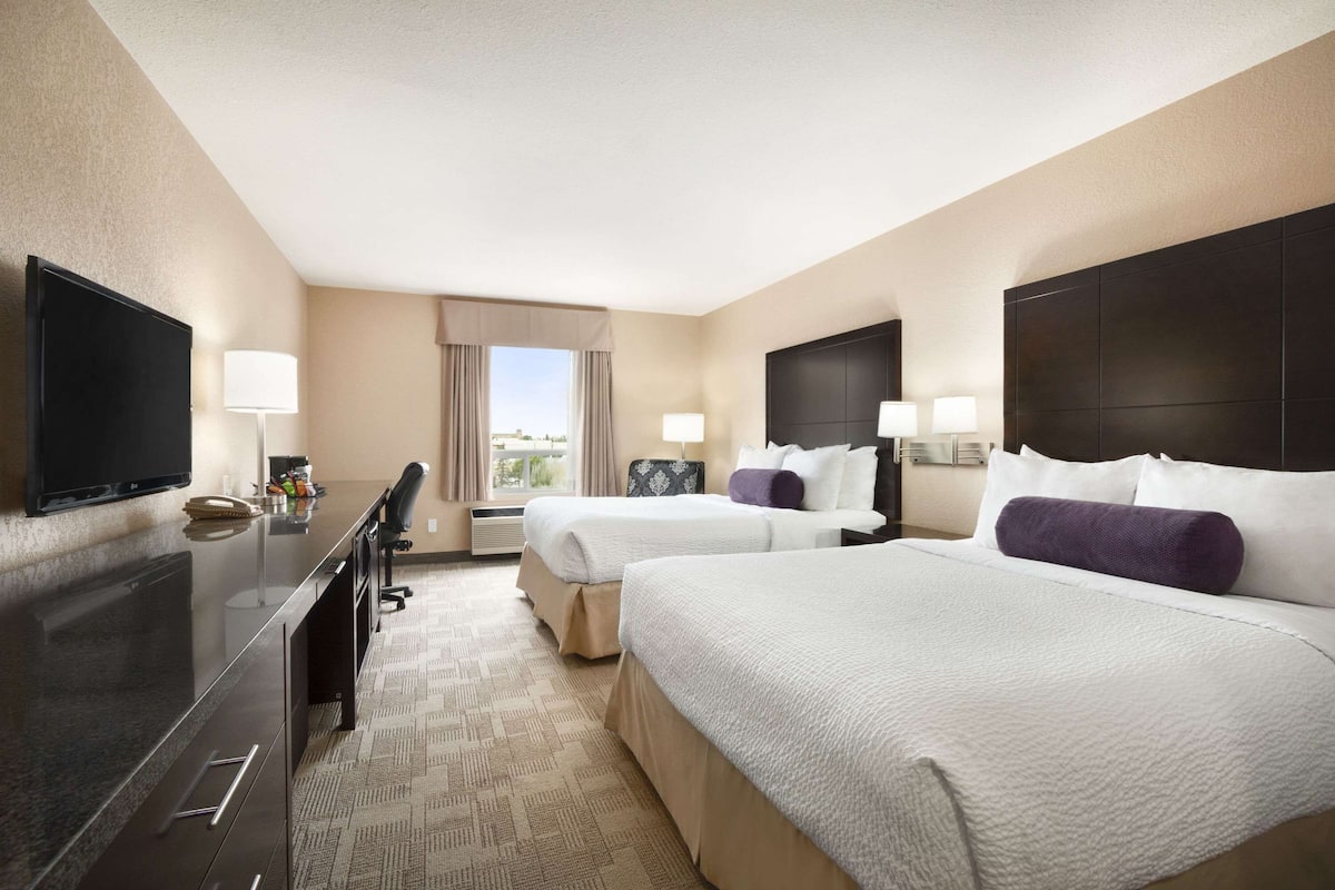 Premium bedding, desk, blackout curtains, iron/ironing board