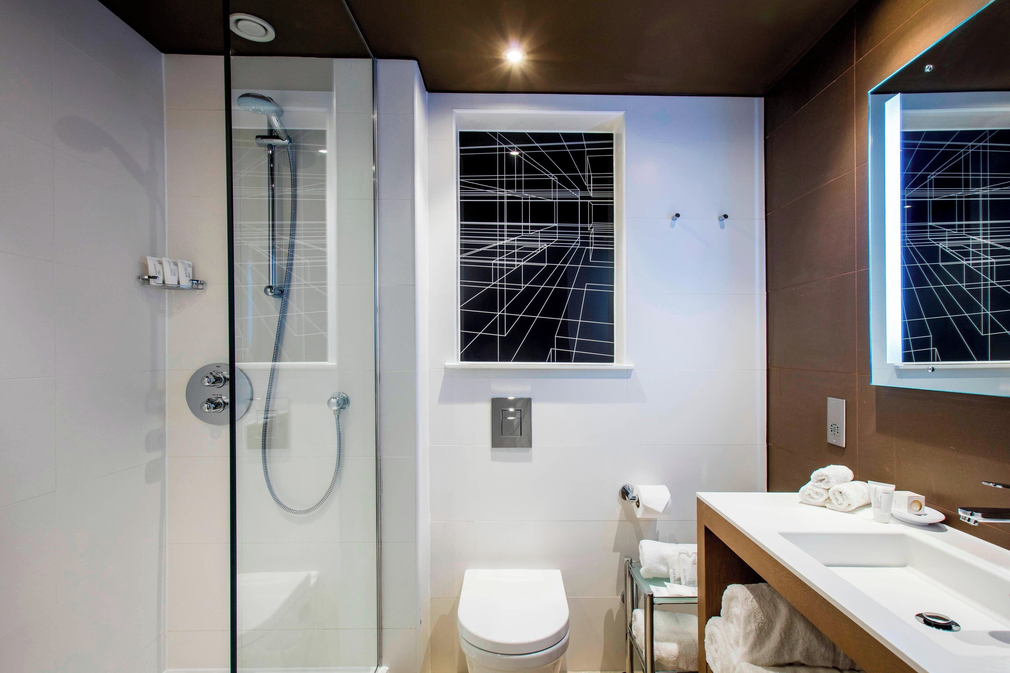 shower, free toiletries, hair dryer, towels