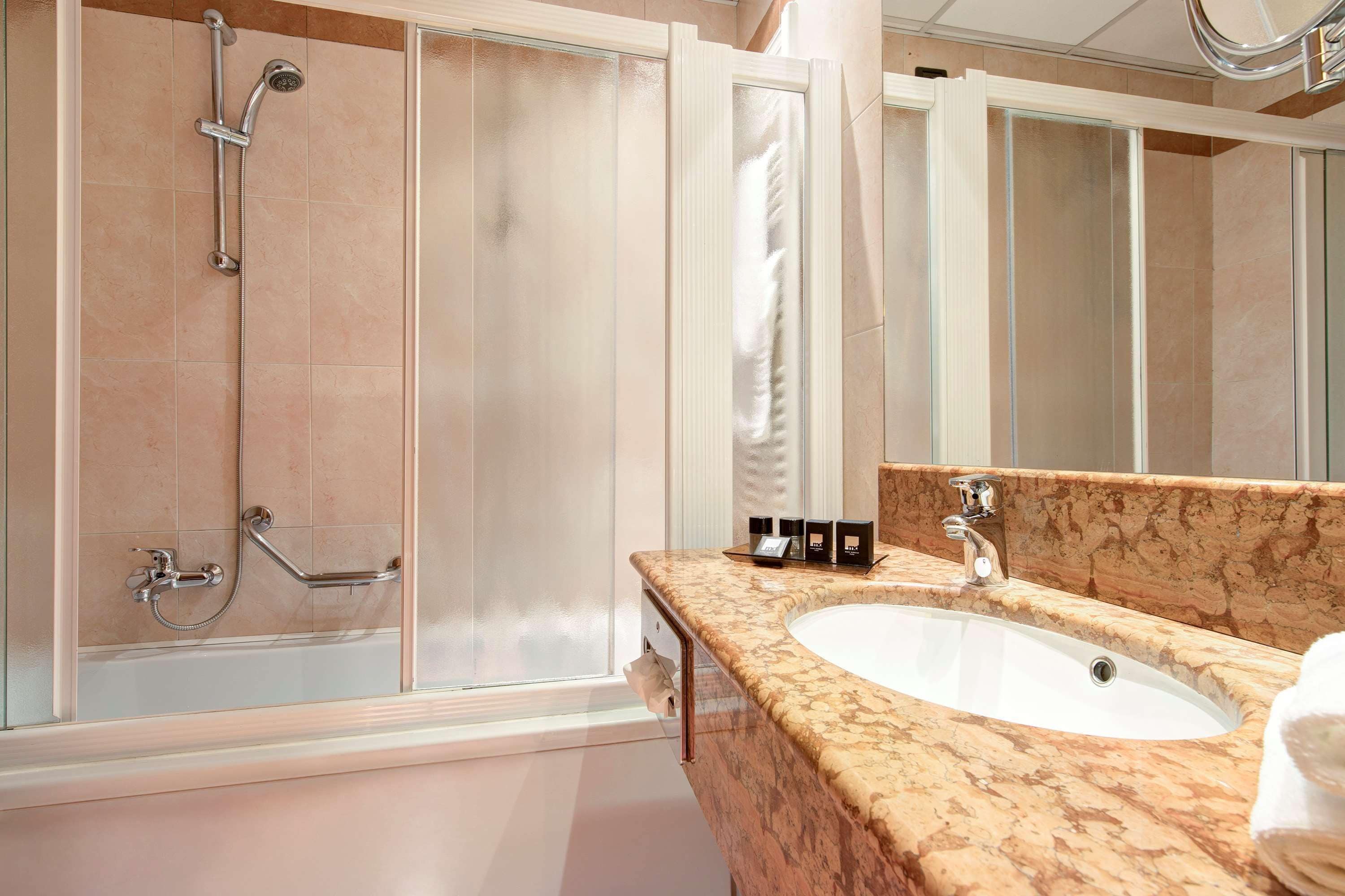 free toiletries, hair dryer, bidet, towels