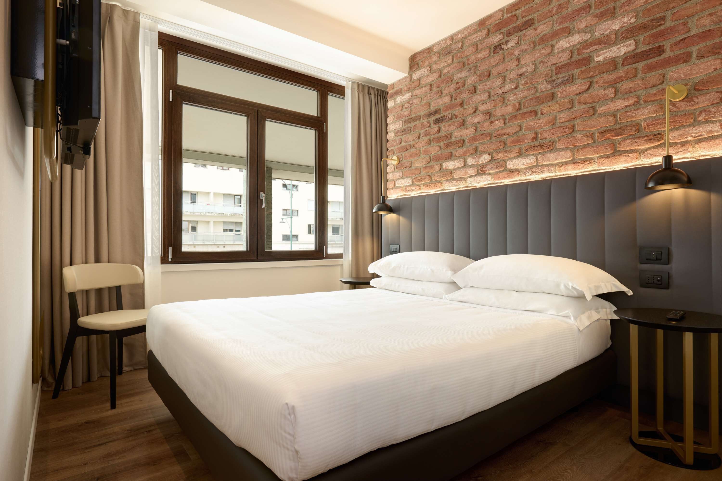 family room, 2 queen beds (converts to 2 twin beds) | minibar, in-room safe, desk, blackout curtains