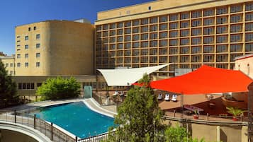 Seasonal outdoor pool, open 8:00 AM to 10 PM, pool umbrellas