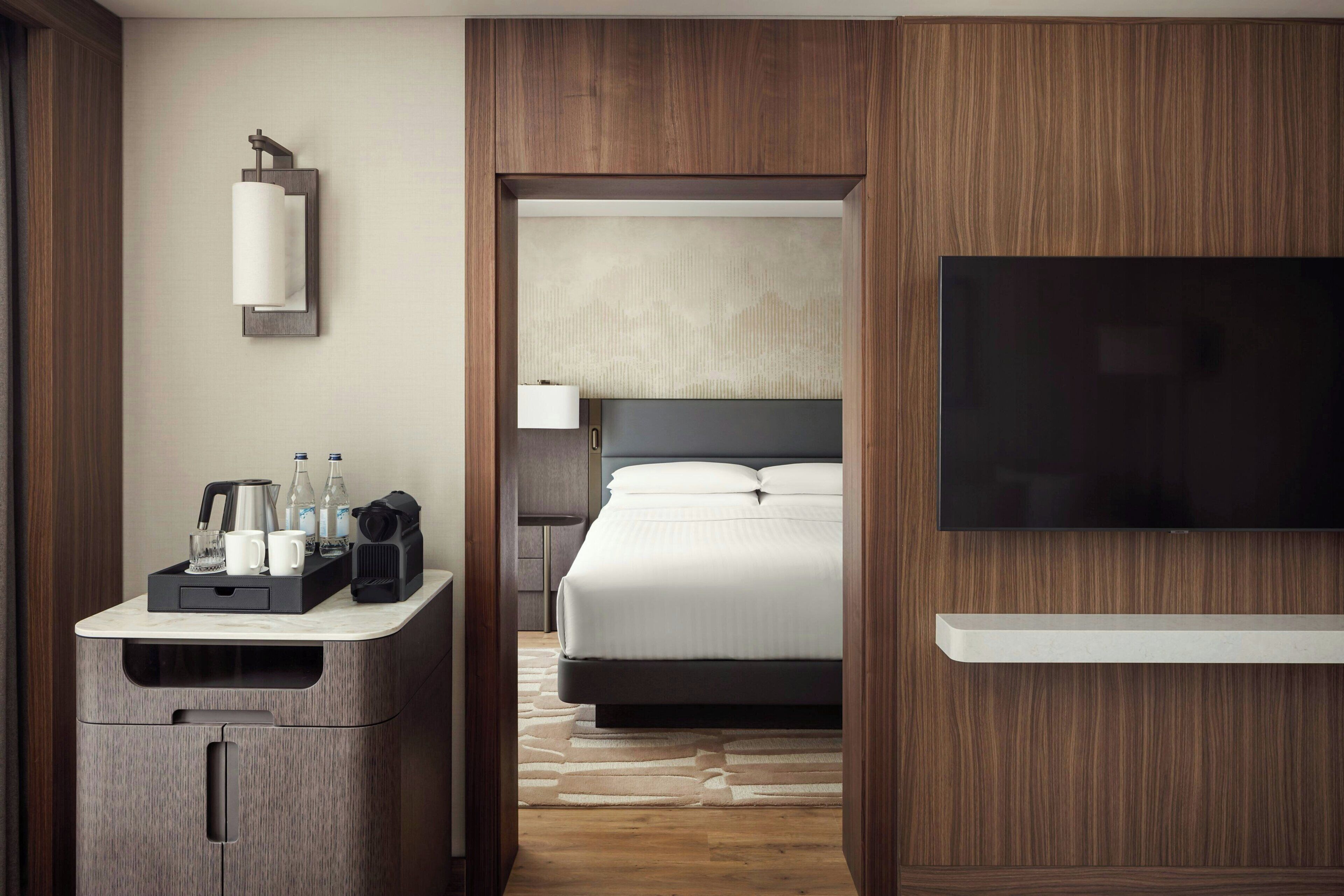 Premium bedding, down comforters, minibar, in-room safe