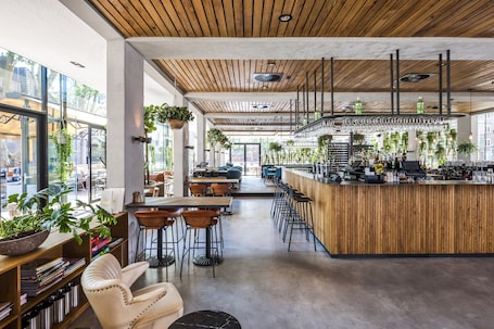 Breakfast, lunch, dinner served; Mediterranean cuisine, garden views