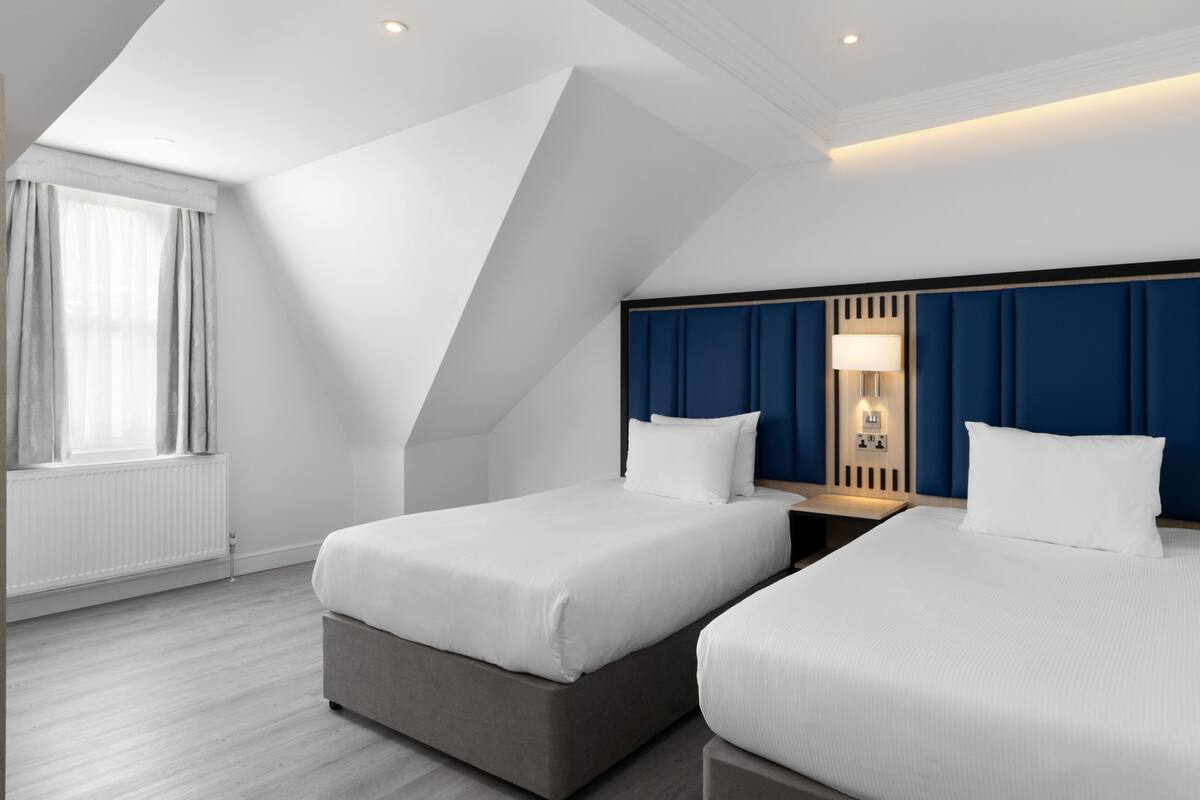 Twin Room, 2 Twin Beds | In-room safe, desk, laptop workspace, soundproofing