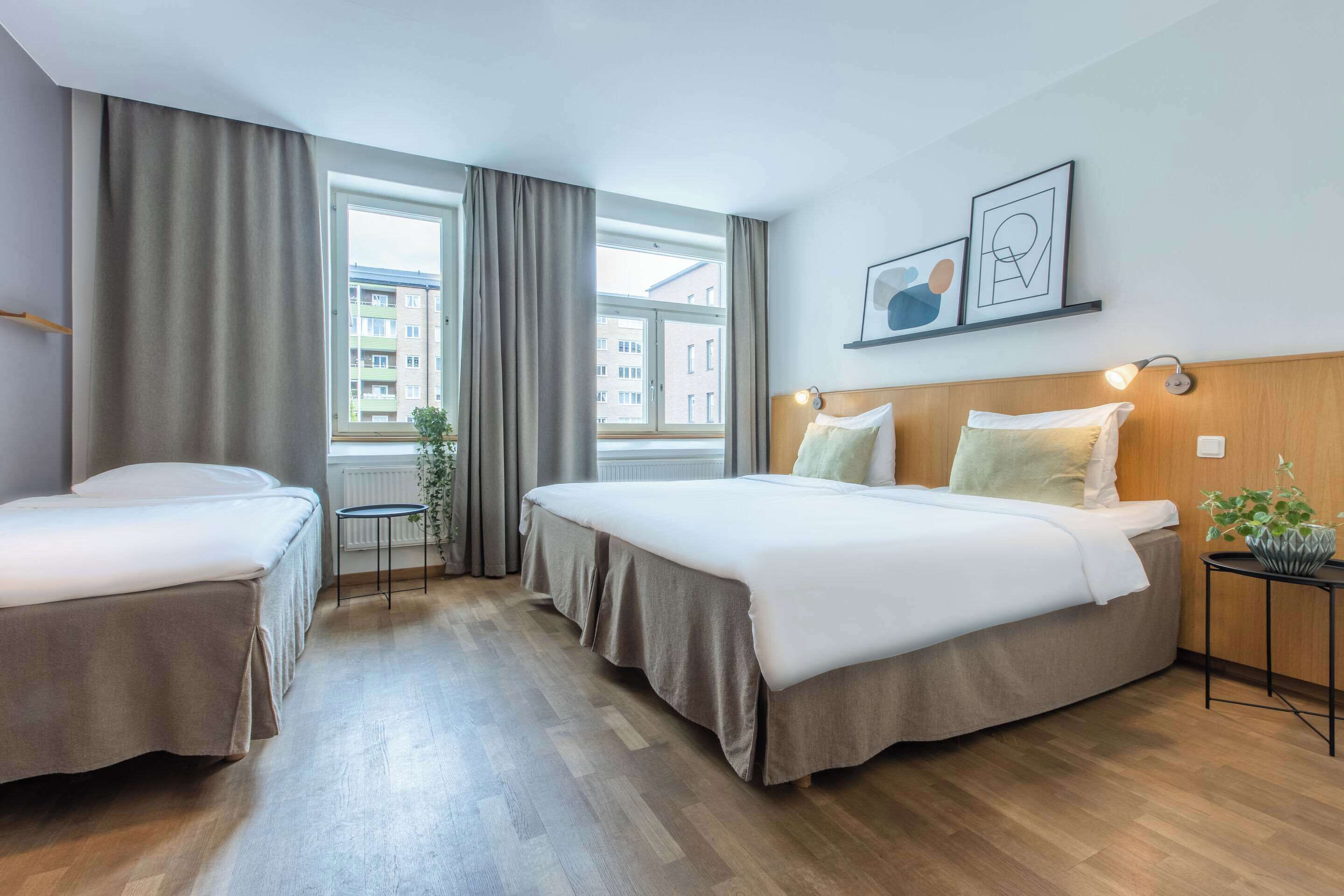 family room | premium bedding, pillow-top beds, laptop workspace, blackout curtains