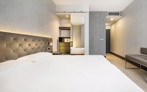 Ropa de cama de alta calidad y minibar