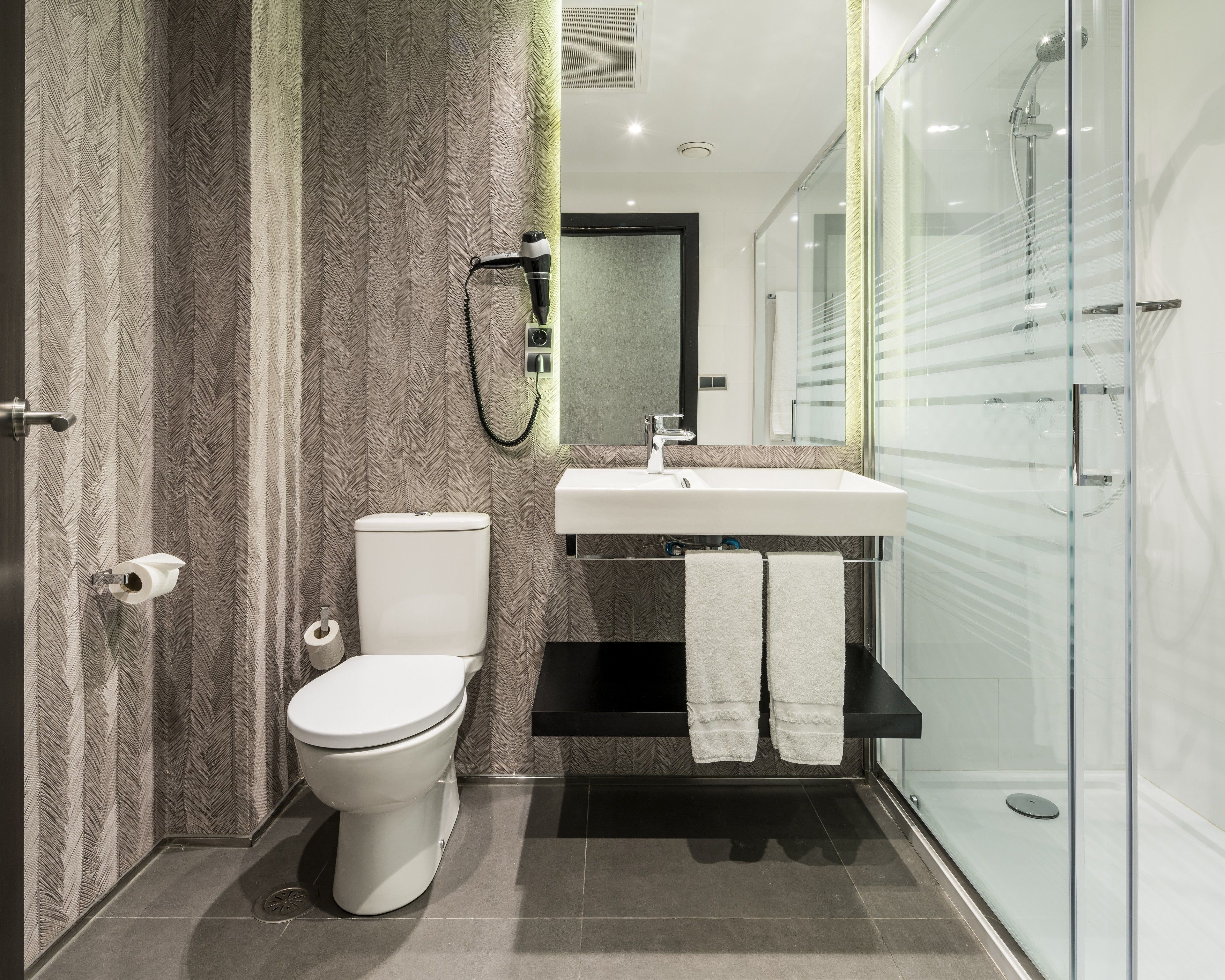 rainfall showerhead, eco-friendly toiletries, hair dryer, bidet