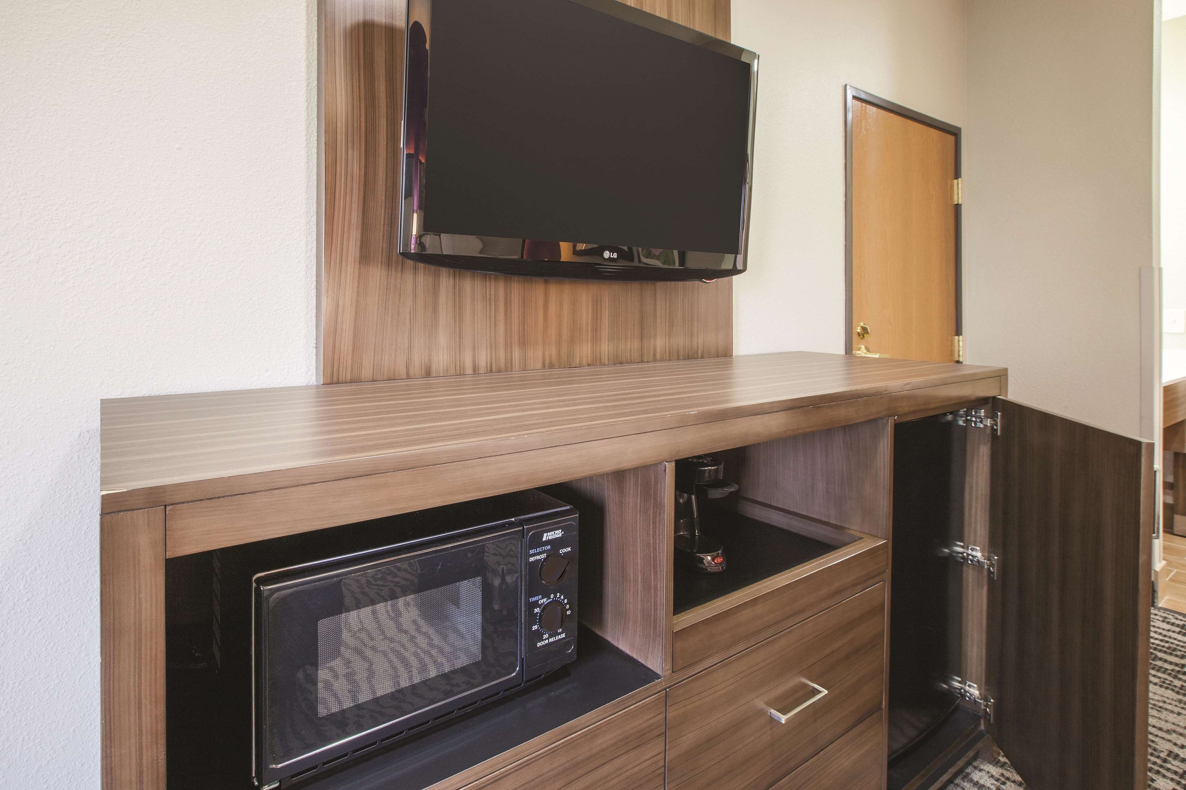 premium bedding, desk, laptop workspace, blackout curtains