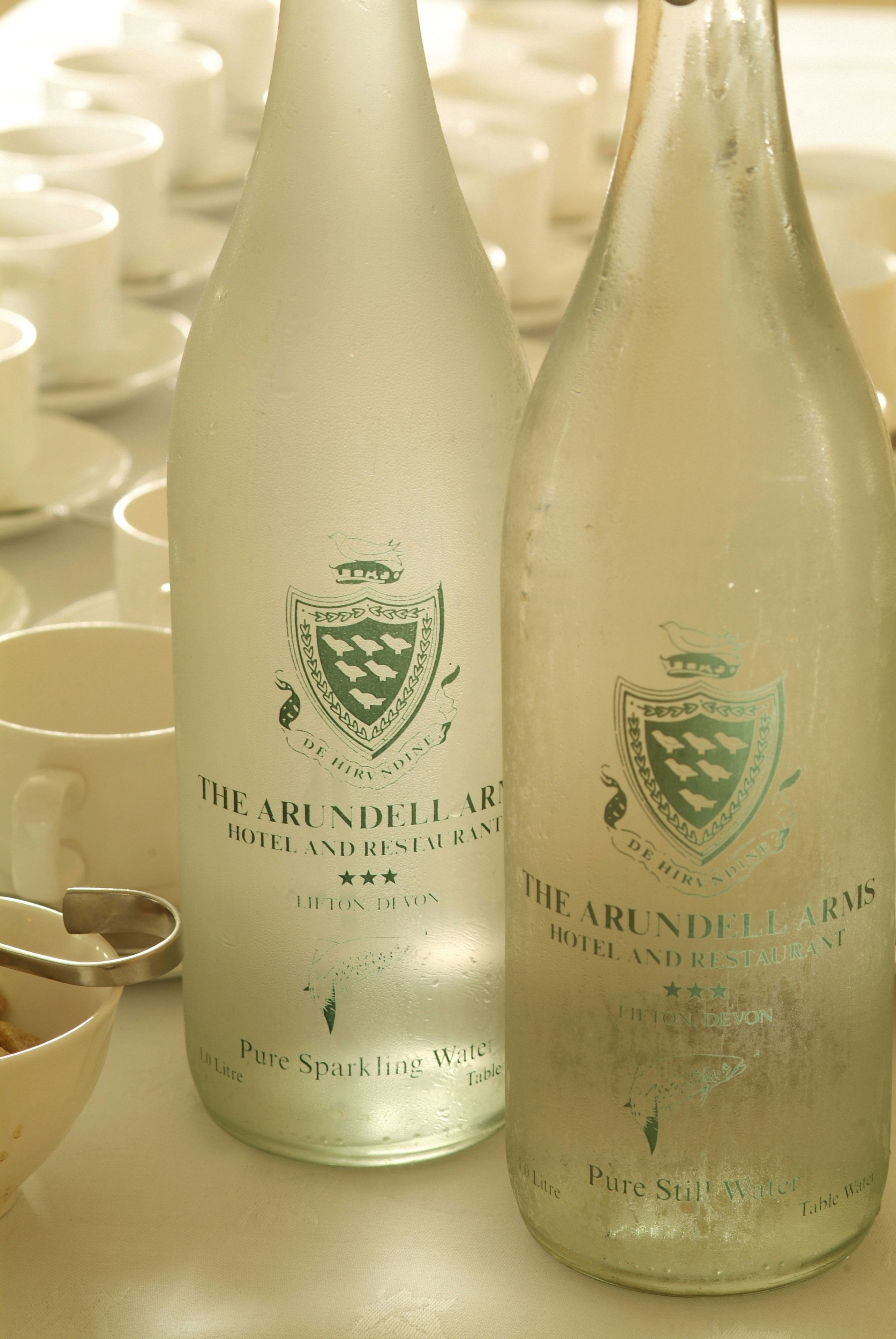 Two bottles of The Arundell Arms Hotel and Restaurant's Pure Sparkling Water.