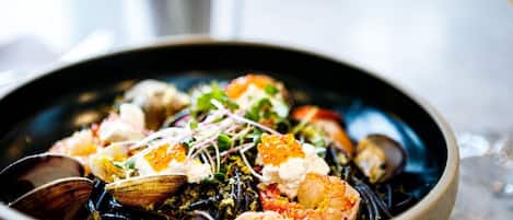 A seafood dish in a bowl.