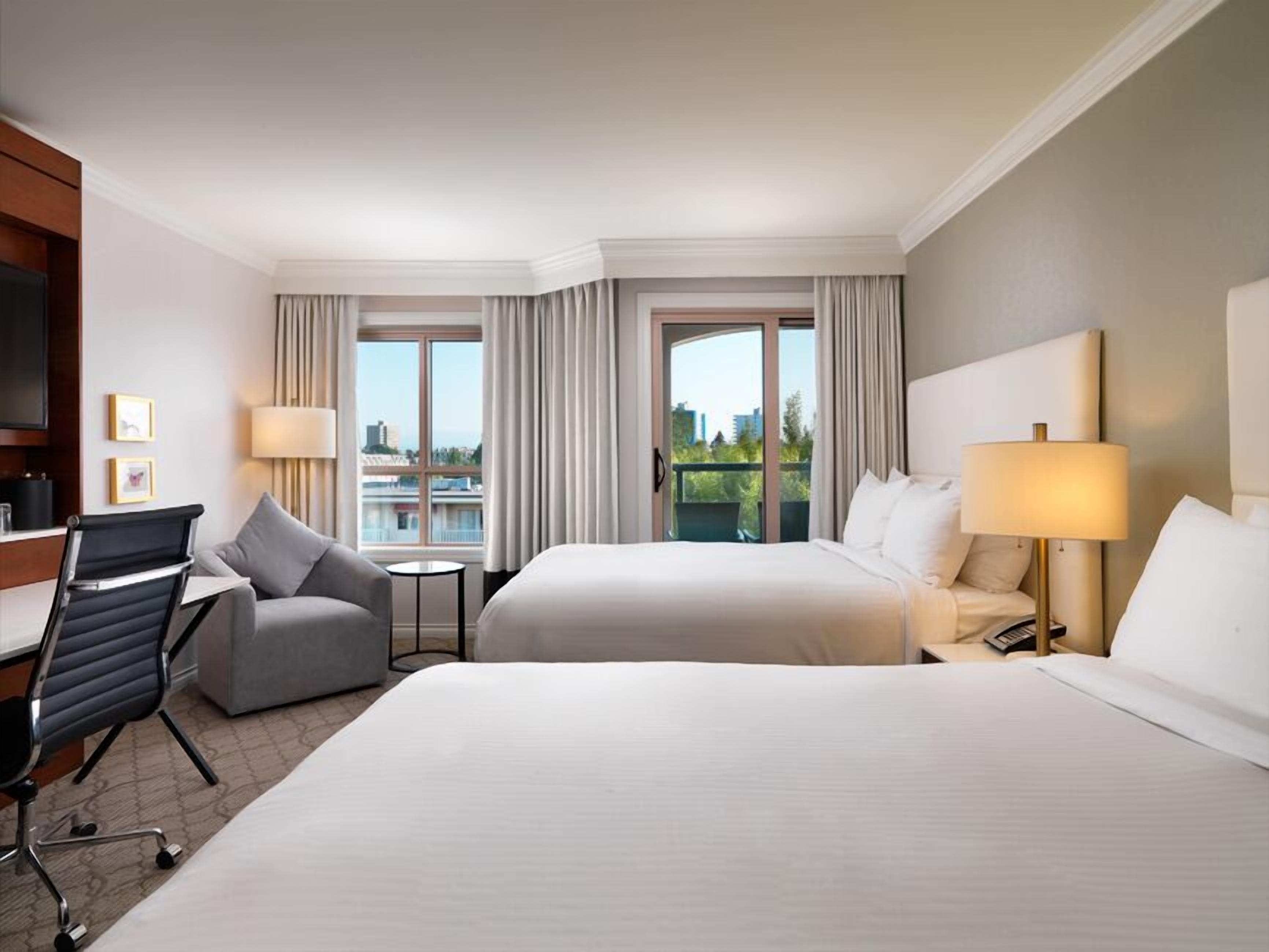 Signature Room, 2 Queen Beds | Hypo-allergenic bedding, in-room safe, desk, laptop workspace