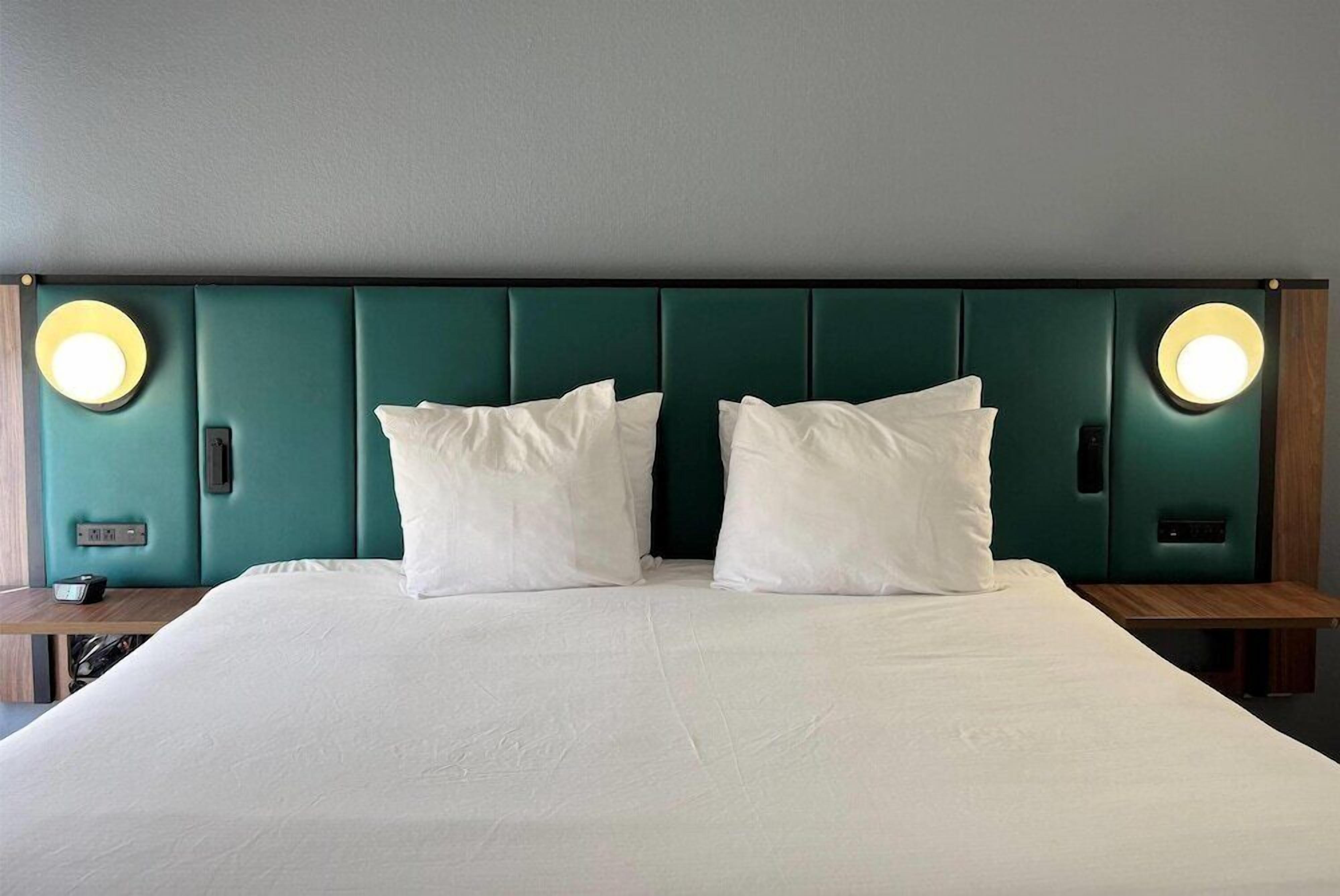 Premium bedding, in-room safe, desk, soundproofing