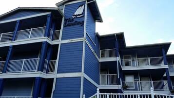 A multi-story hotel with balconies and a sign reading "The Landing".