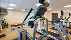 A fitness center with treadmills, ellipticals, and a stationary bike. - Holiday Inn Express Hotel & Suites PEORIA NORTH - GLENDALE by IHG (Peoria)