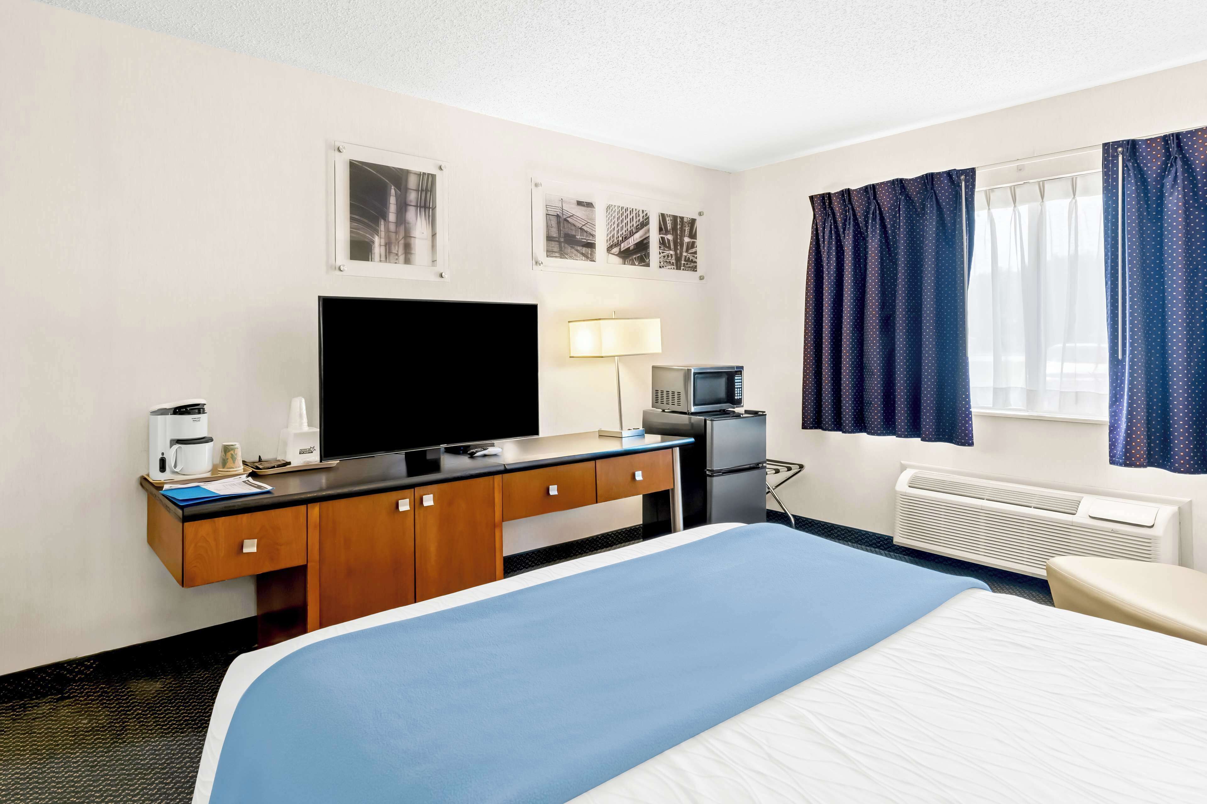 in-room safe, desk, blackout curtains, iron/ironing board