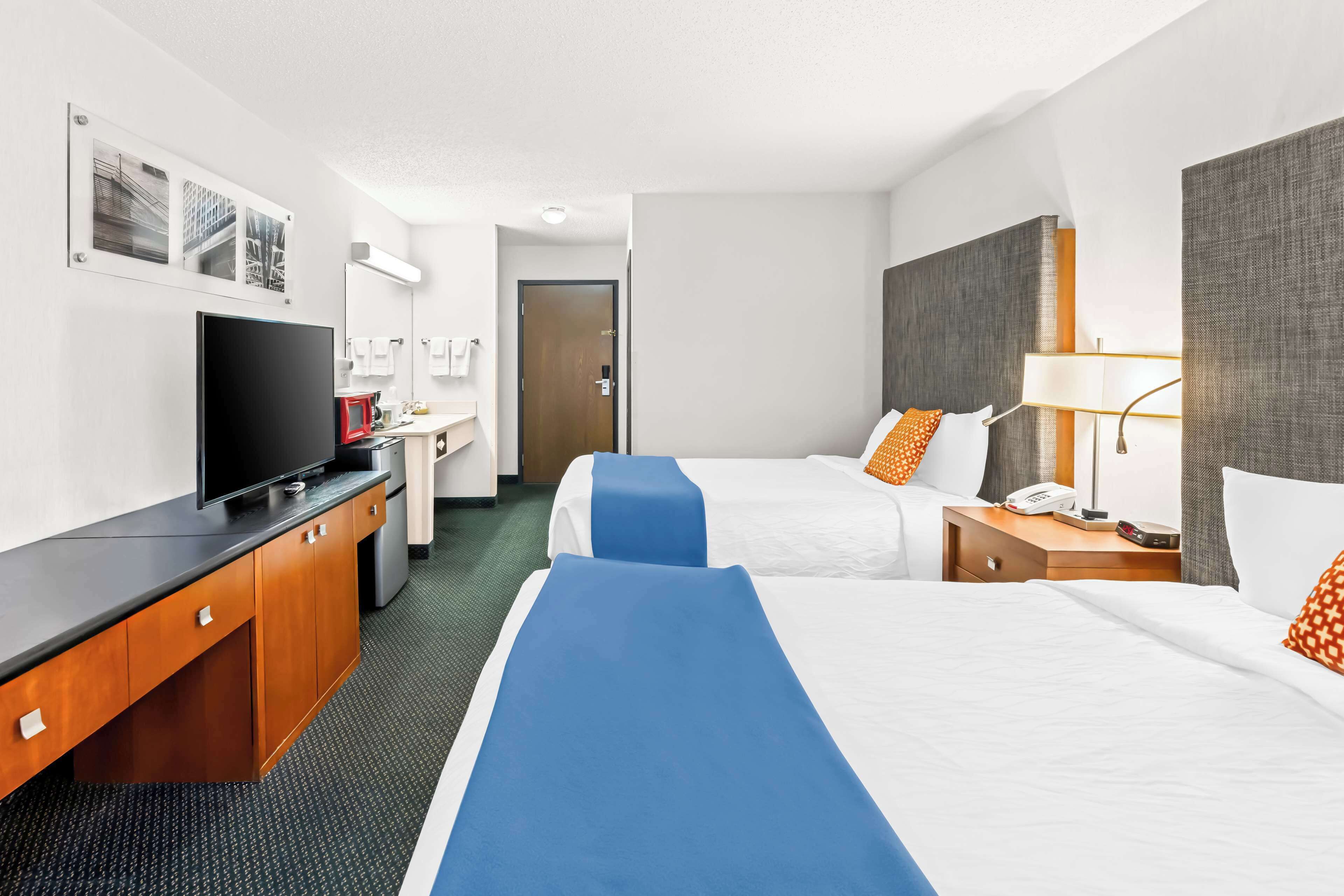 room, 2 queen beds, non smoking | in-room safe, desk, blackout curtains, iron/ironing board