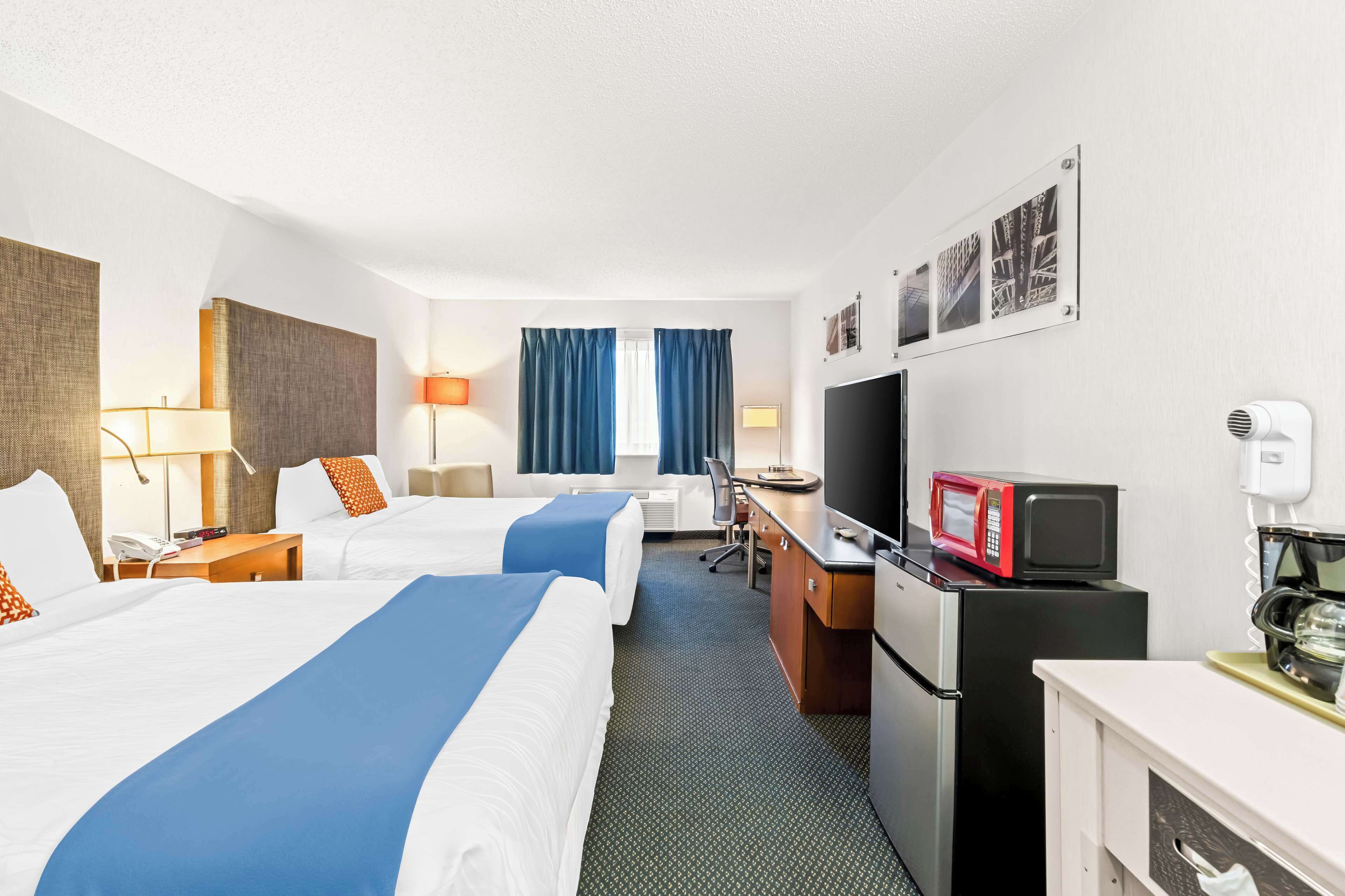 room, 2 queen beds, non smoking | in-room safe, desk, blackout curtains, iron/ironing board