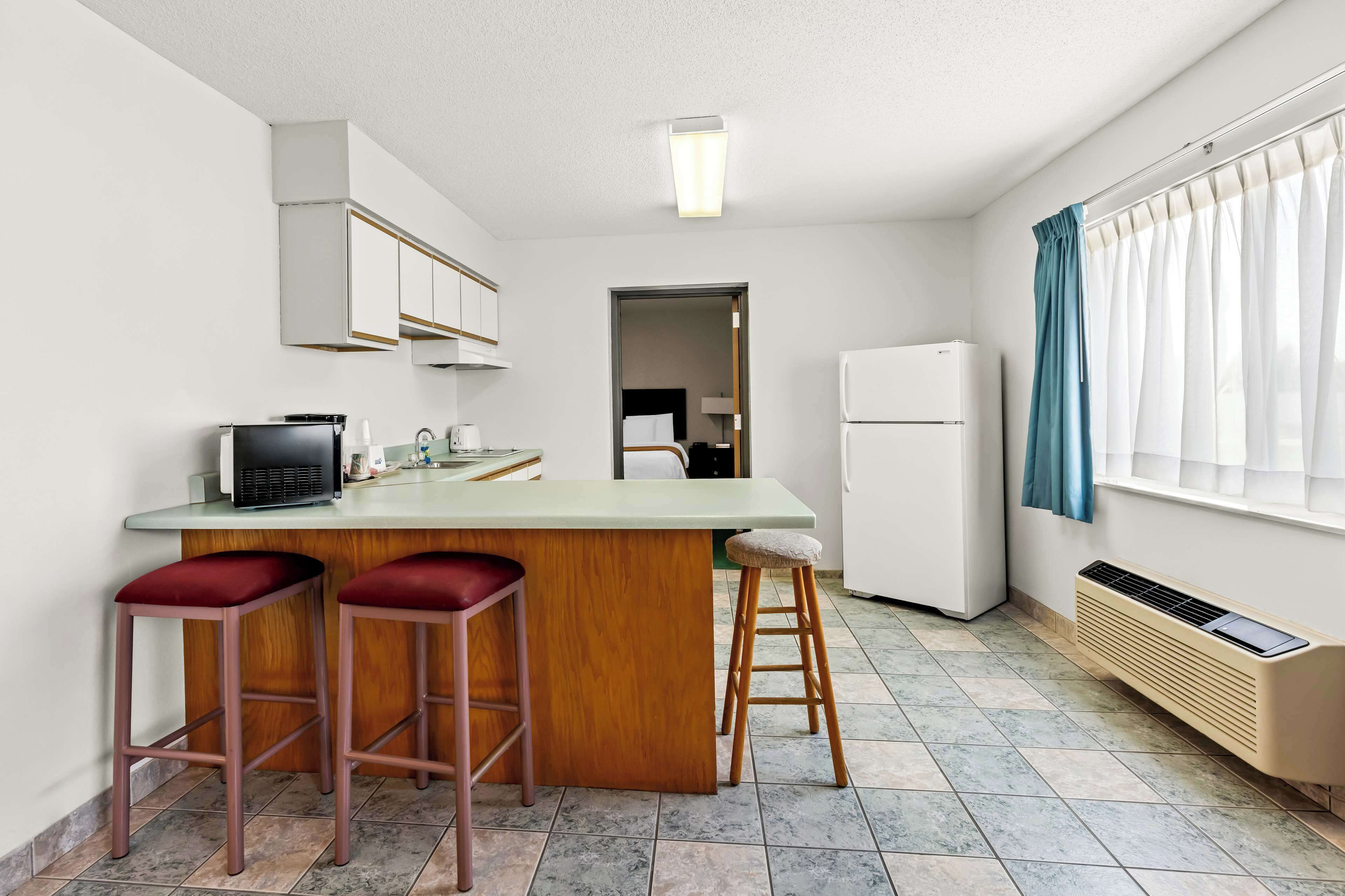 in-room safe, desk, blackout curtains, iron/ironing board