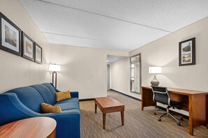 Suite, 1 King Bed, Non Smoking | Premium bedding, desk, laptop workspace, iron/ironing board