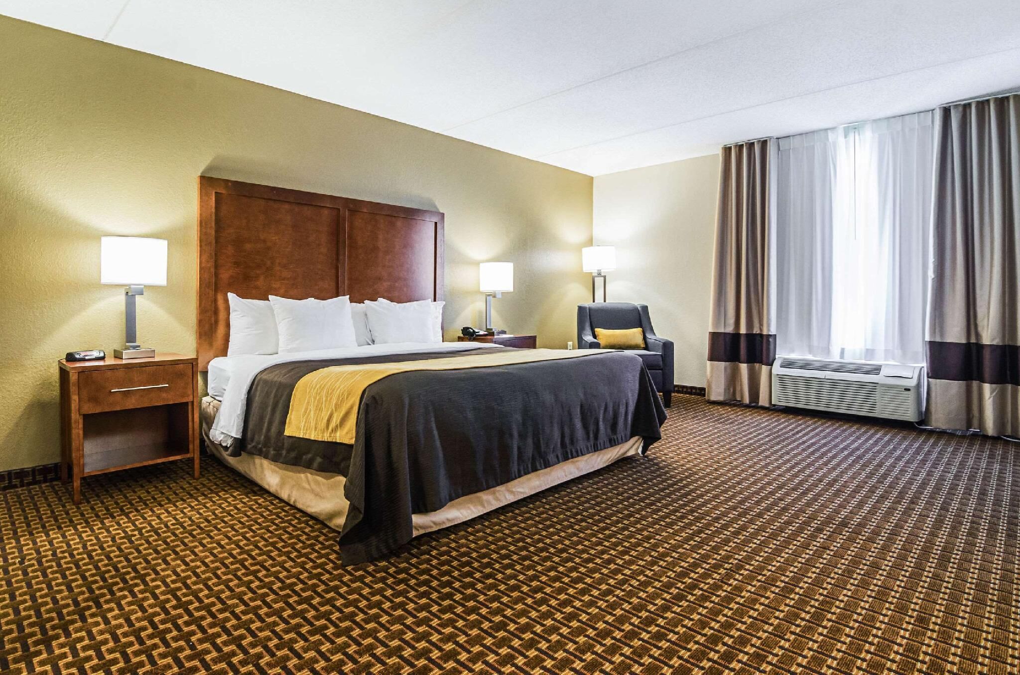 Premium bedding, desk, laptop workspace, iron/ironing board