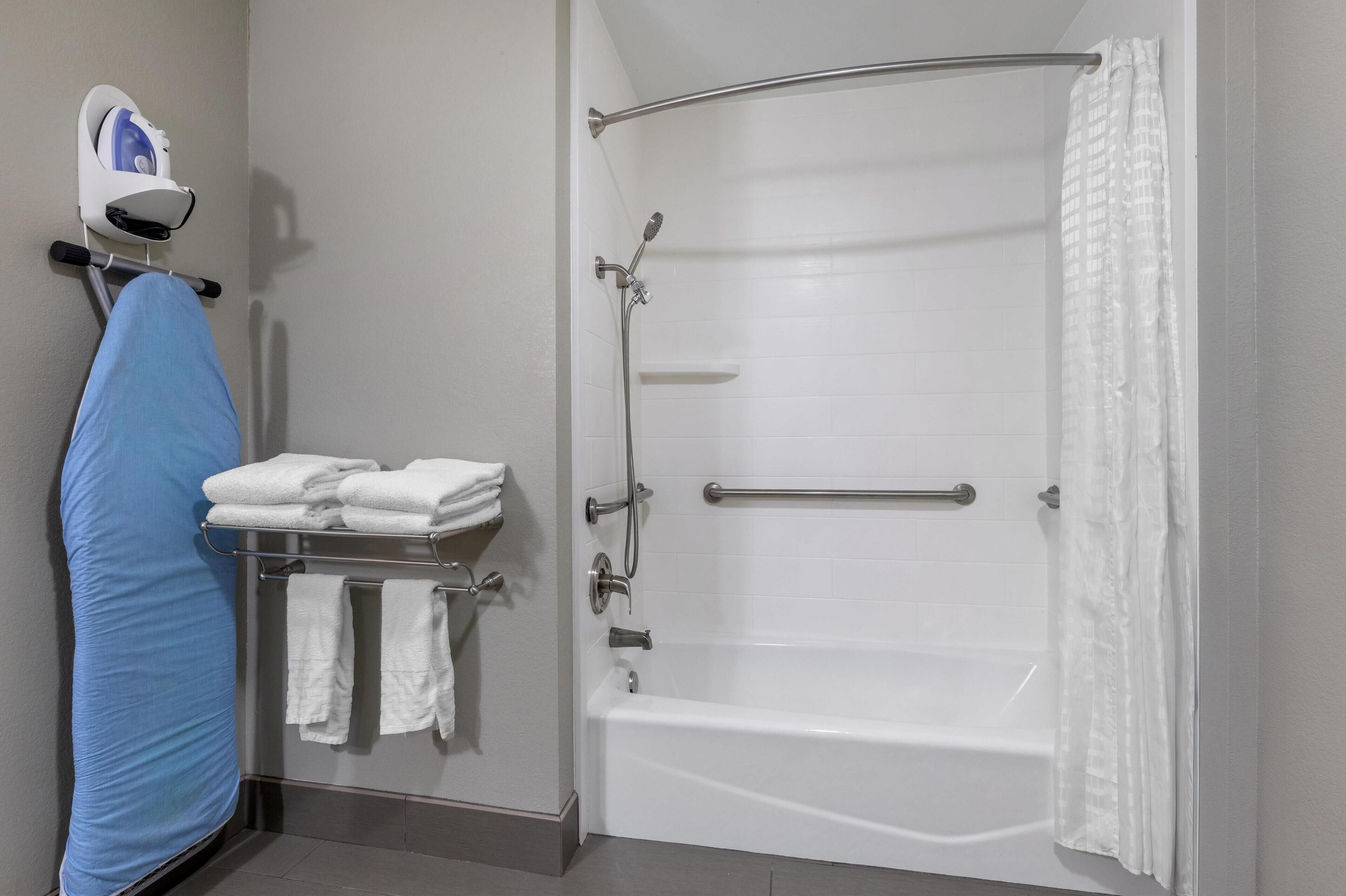 combined shower/bathtub, free toiletries, hair dryer, towels