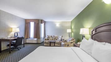 Desk, laptop workspace, blackout drapes, iron/ironing board