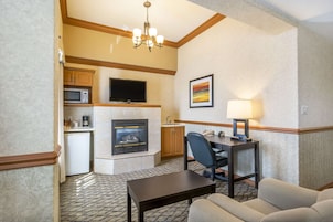 Desk, laptop workspace, blackout drapes, iron/ironing board